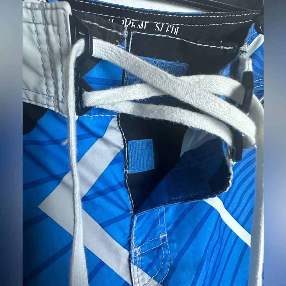Billabong Blue and Black Board Shorts with Geometric Design - Picture 9 of 9